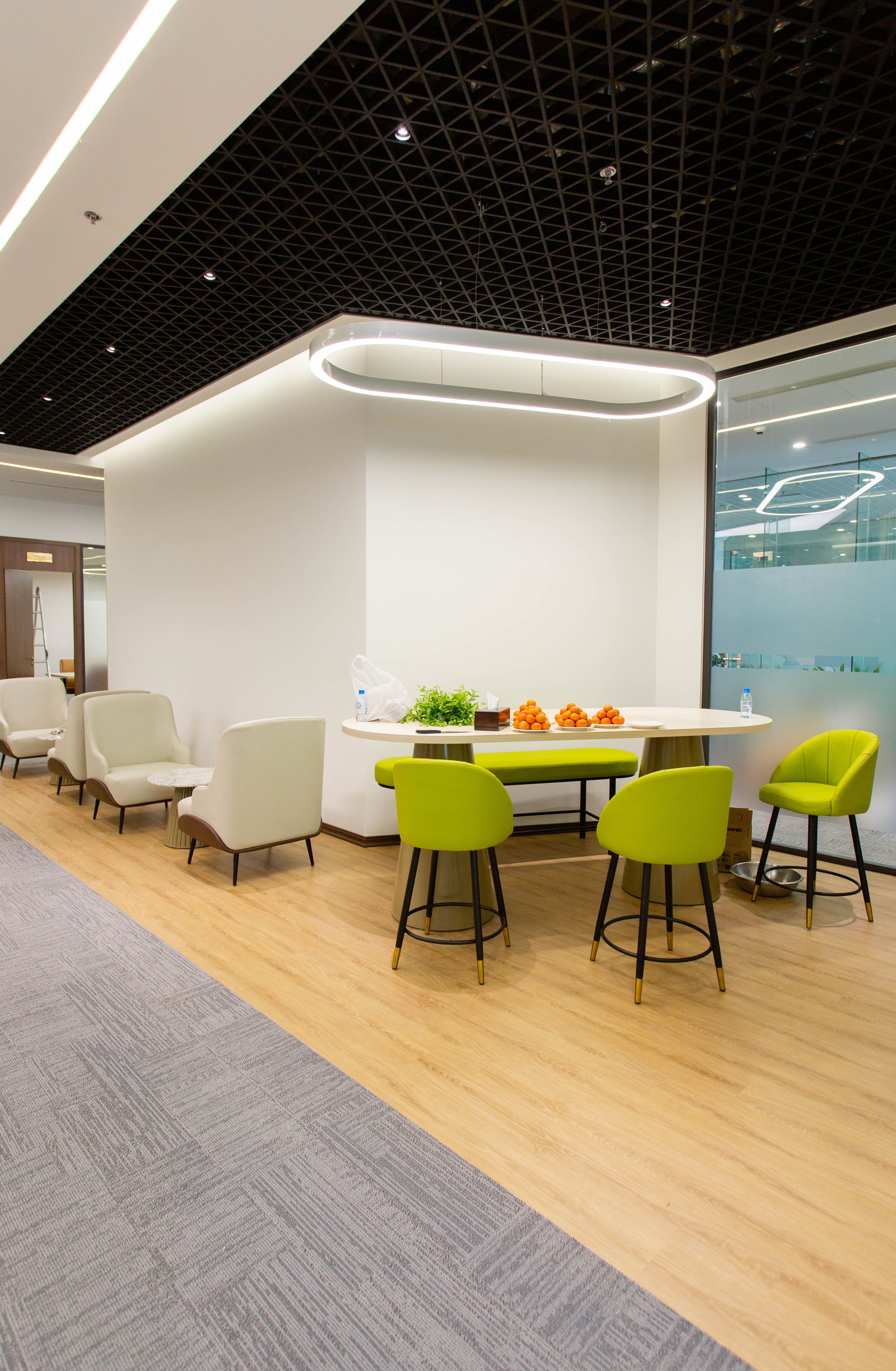 Commercial breakout lounge with designer seating by Beyond Briks