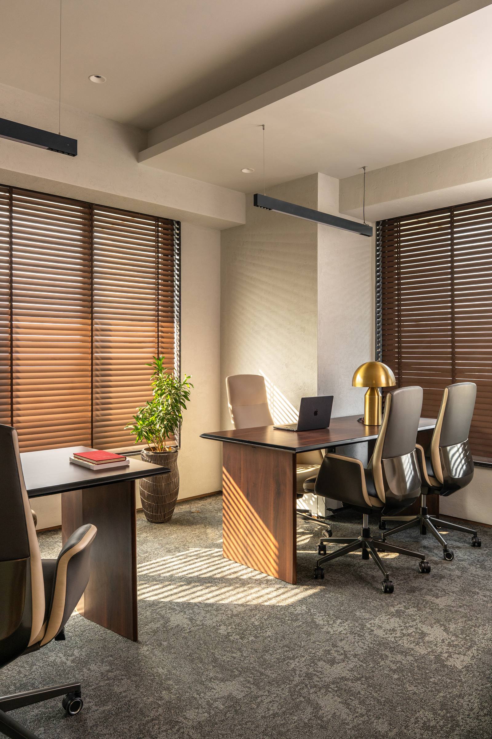 Executive home office cabin with wood paneling by Beyond Briks