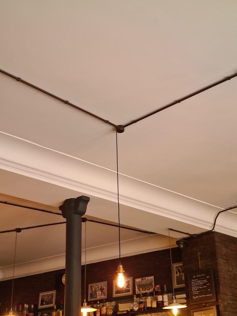 Decorative pendant lighting detail in a premium restaurant interior