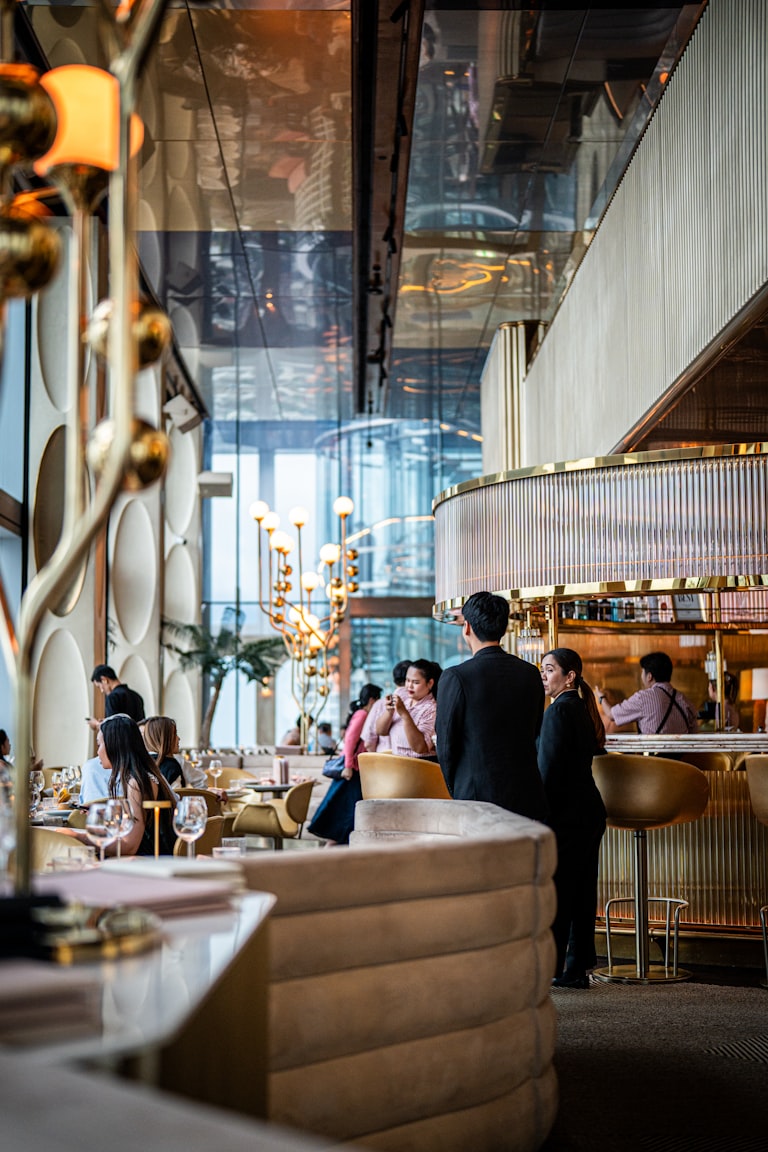 Luxury restaurant interior designed by Beyond Briks with gold accents